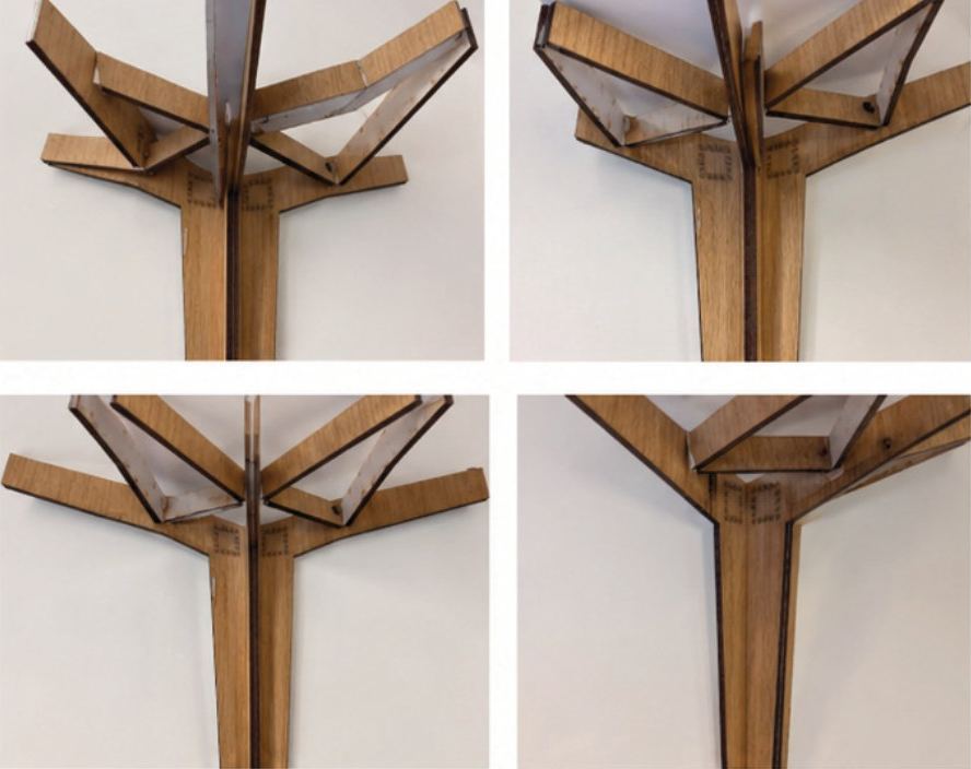 Four photographs of a laser-cut timber model of a branching tree-like column with angled arms and white card infills, against a white wall.