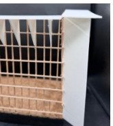 Tectonic model of a timber-stick lattice on a cork base beneath a folded white card roof with triangular fins.